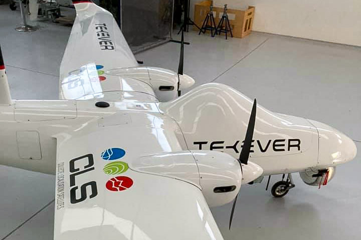 A drone able to deploy rescue raft to people in distress at sea